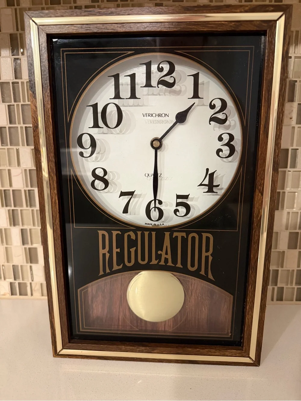 Brown and Black Regulator Wall Clock